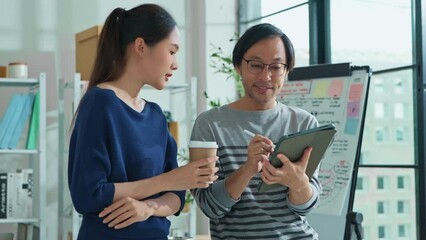 Business person co worker friend having discussion with his partner colleague in creative office  businessteam talking with colleagues in meeting in office open plan modern office room daytime