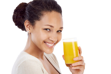 Smile, portrait or woman with orange juice in studio for wellness, nutrition or detox on white background. Face, happy or female nutritionist with glass of vitamin C, supplement or health fruit drink