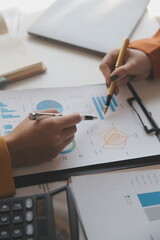 .Team of business people working together in the meeting room office, teamwork background charts and graphs banner, double exposure successful teamwork,business planning concept.