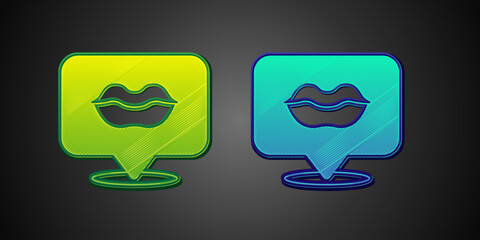 Green and blue Smiling lips icon isolated on black background. Smile symbol. Vector