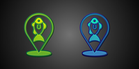 Green and blue Location fishing icon isolated on black background. Fishing place. Vector