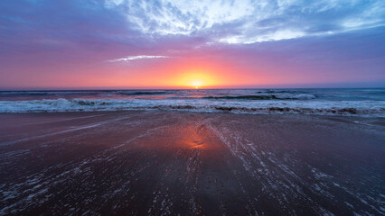 Scenic sunset at Sandwich Harbour, Namibia