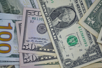 Fototapeta na wymiar one hundred dollar banknotes, dollars background, cash money, market