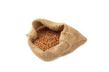 Raw buckwheat in burlap isolated on white background.Wheat grains, porridge, cereal, raw buckwheat in a plate. Healthy food. Porridge. Diet. Organic cerea. Space for text.Copy space.