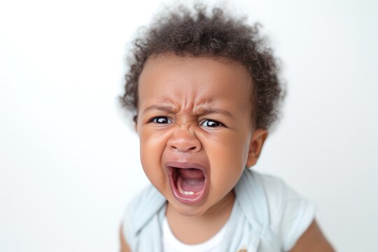A closeup photo of a cute little baby boy child crying. Ai generative