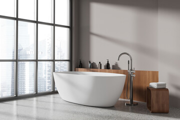 Stylish home bathroom interior with tub, shelf with window and mockup wall
