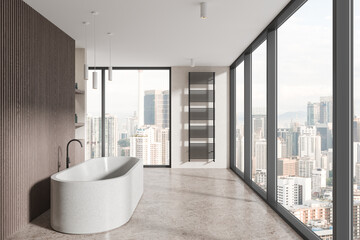 White and brown bathroom interior with tub