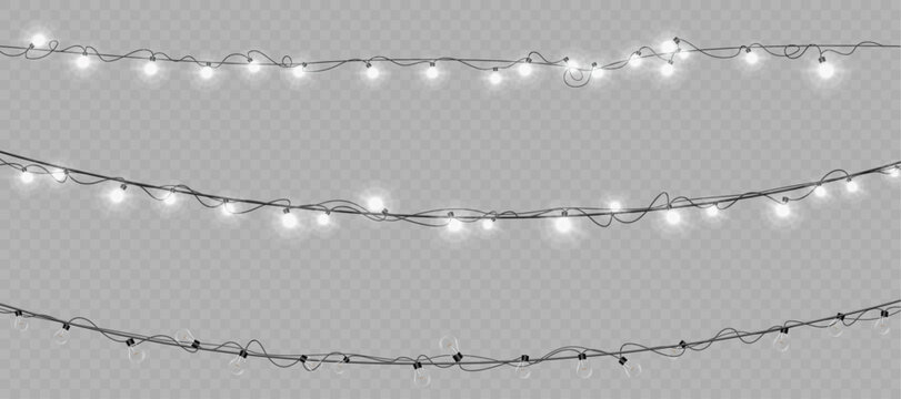 Christmas glowing garlands. Christmas lights isolated on transparent background. For congratulations, invitations and holiday design.	