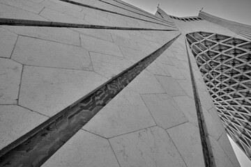 The Azadi Tower (Shahyad Tower). Details of Azadi tower. Black and white photo.