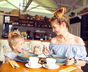 Mother and daughter in a restaurant