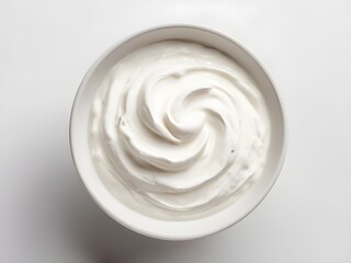 Top view of isolated bowl of sour cream