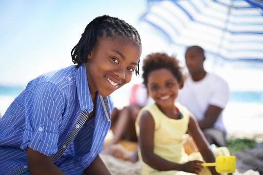 Portrait, Black Person And Child On Beach With Family For Adventure, Holiday Or Vacation In Summer. African Kid, Face And Smile Outdoor In Nature For Break, Experience Or Bonding With Relationship