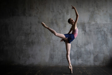 Dancing young ballerina.