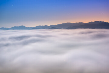 The sea of clouds on a quiet moonlit night makes you feel unpredictable. Peaks surrounding Emerald...