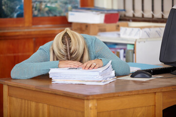 Tired, teacher or sleeping at desk with paperwork, stress or burnout for documents deadline in...