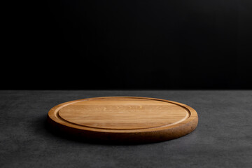 wood cutting board on gray stone