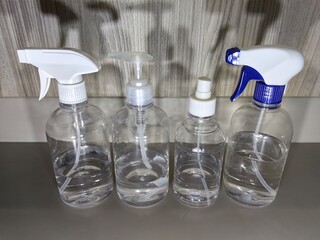 4 bottles of disinfectant alcohol with different pumps