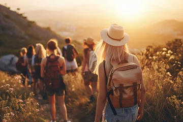 Poster Friends on hiking route traveling together fun activity mountains nature sports healthy lifestyle summer travel carrying backpack friendship group walk weekend leisure holiday carefree hikers tourists © Yuliia