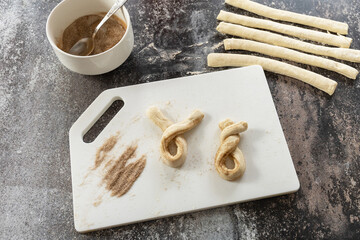 Cooking Easter rabbit-shaped buns puff pastry with  cinnamon, step by step, step 3.