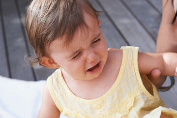 Baby, girl and unhappy or crying outside on porch, sad and upset for mistake or fail in childhood....