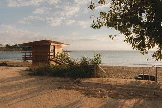 beach hut at sunset