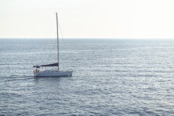 Tourist on the Sailboat serenely explore the beautiful Mediterranean Sea.