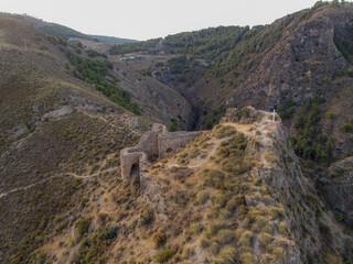 An aerial view of the historic Castle ruins of Mondujar Spain