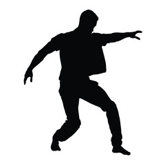Fototapeta na wymiar silhouette of a male dancer in action pose