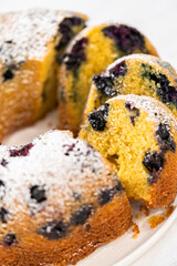 Lemon blueberry bundt cake with powdered sugar dusting