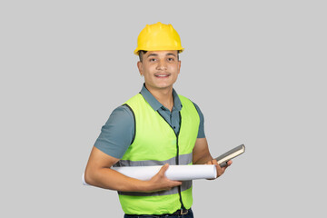 An Asian Happy Construction Worker Engineer giving expression gestures with chartpaper and notebook