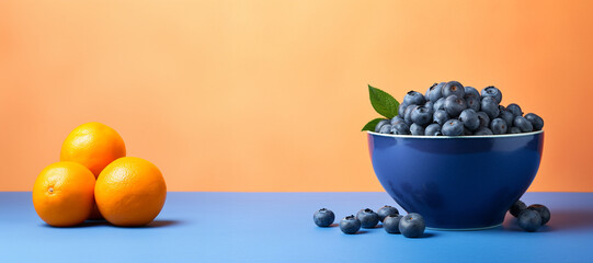 a colorful fruit arrangement of blueberries and oranges