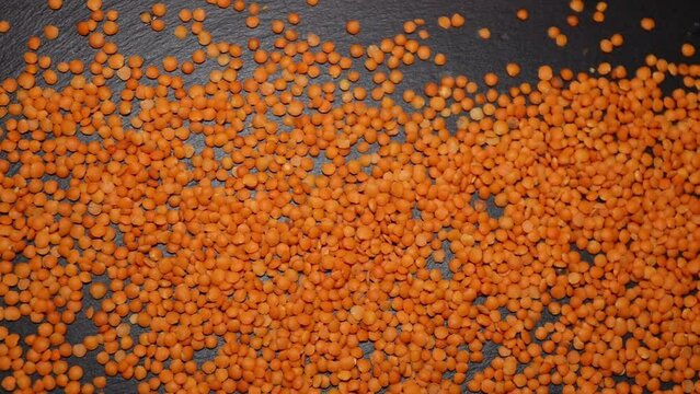 Raw red lentils, top view. Natural food for a healthy lifestyle