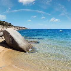 Big boulder on beach. Summer sea view (Valti, Sithonia, Halkidiki, Greece).
