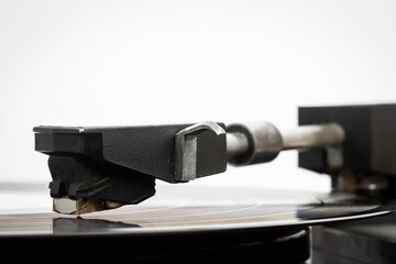 Fototapeta na wymiar Close up of turntable needle on a vinyl