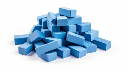 a pile of blue building bricks on a white background.