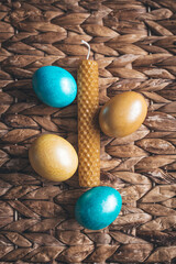 Still life Easter eggs and Easter cake on the table in Ukrainian style. The concept of home comfort in the bright holiday of Easter.