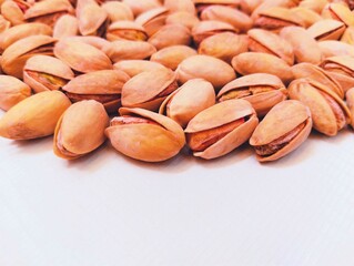 Pistachio nuts cracked dry and salted dry fruit food roasted pistachios pista closeup pistacia vera pistache pistazie  image picture stock photo