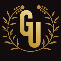 GU letter branding logo design with a leaf..
