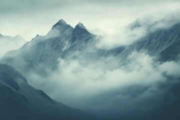 Distant mountain range shrouded in mist, creating an air of mystery