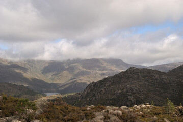 Mountains landscape with small lake and cloudy sky, Gerês mountain in Portugal