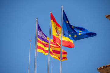 Spanish and European Union flags in summer. Palm de Mallorca.