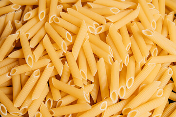 raw pasta is scattered on the table
