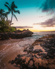 Sunset on the Beach with Palm Trees at Makena Cove in Maui, Hawaii near Kihei