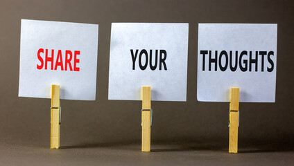 Share your thoughts symbol. Concept words Share your thoughts on beautiful white paper on clothespin. Beautiful grey table grey background. Business and share your thoughts concept. Copy space.