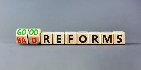 Good or bad reforms symbol. Concept words Good reforms Bad reforms on beautiful wooden blocks....