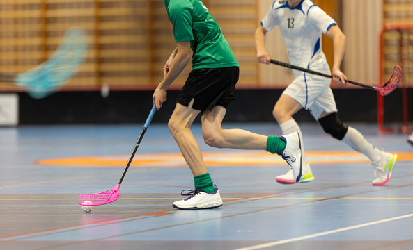 Floorball players playing in a floorball championship game