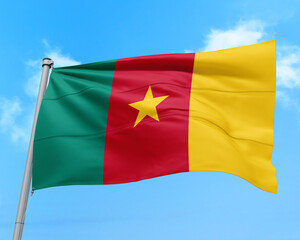Cameroon flag fluttering in the wind on sky.