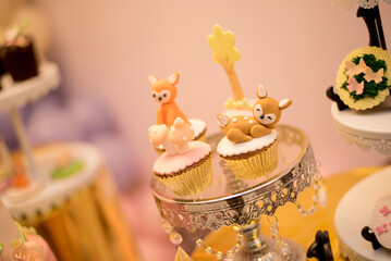 Cupcakes with a deer and a fox