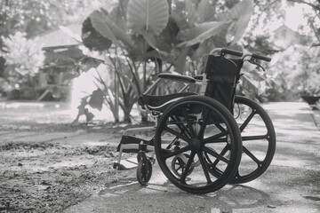 Fototapeta na wymiar Single wheelchair parked in hospital hallway