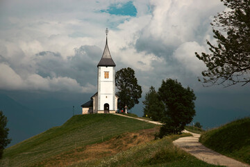 Jamnik, Slovenia - Magical cloudy summer day at Jamnik St.Primoz church.